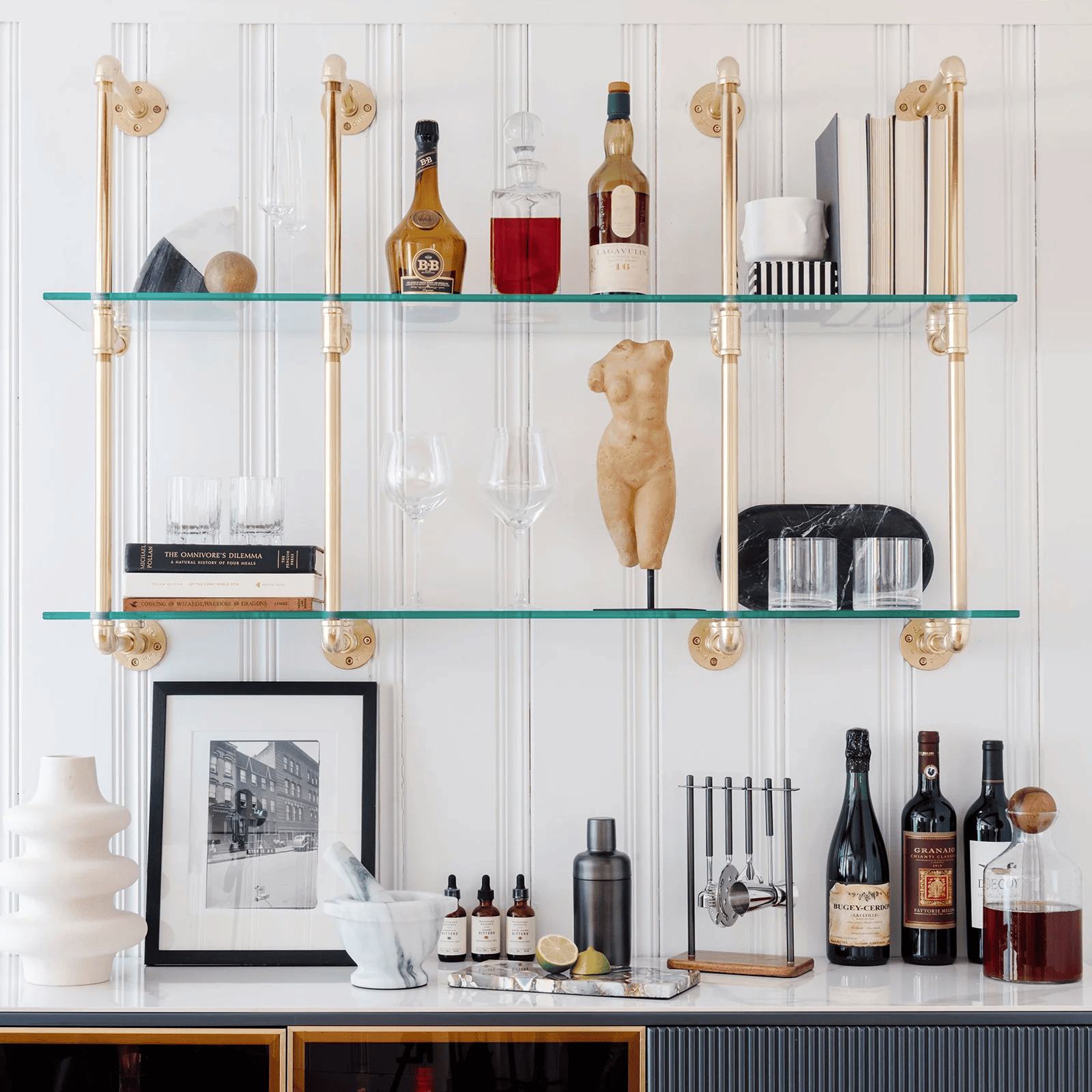 Custom glass shelves showcasing stylish decor and spirits in Colorado by Horizon Glass