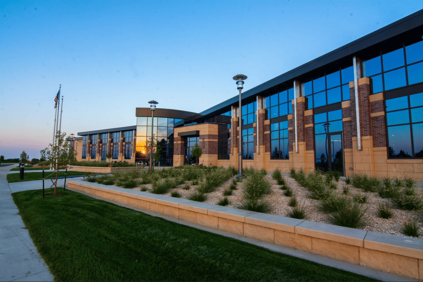 Exterior view of a modern building showcasing switchable privacy glass, Horizon Glass services near me