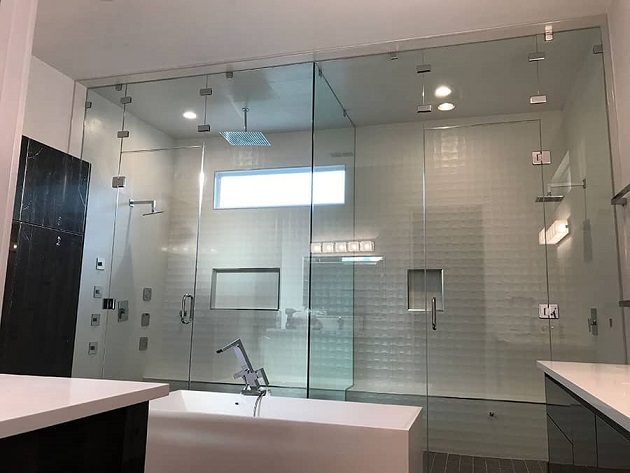 Precision measurement and installation of a glass shower door in Monument, CO, by Horizon Glass experts