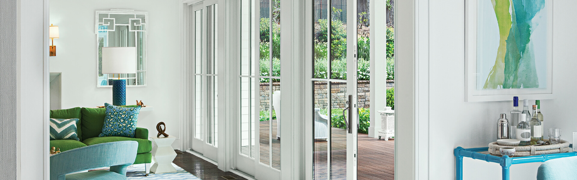 Technician fitting new sliding patio door in Monument, CO home overlooking foothills